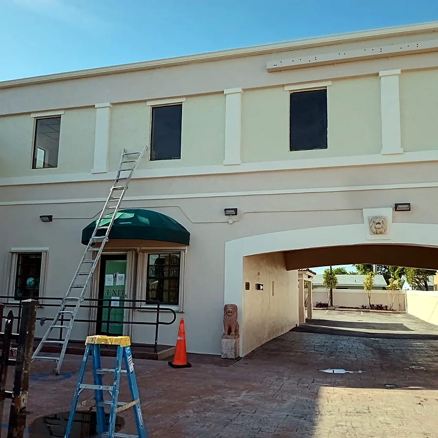 Two-story commercial building repaint underway in Miami-Dade
