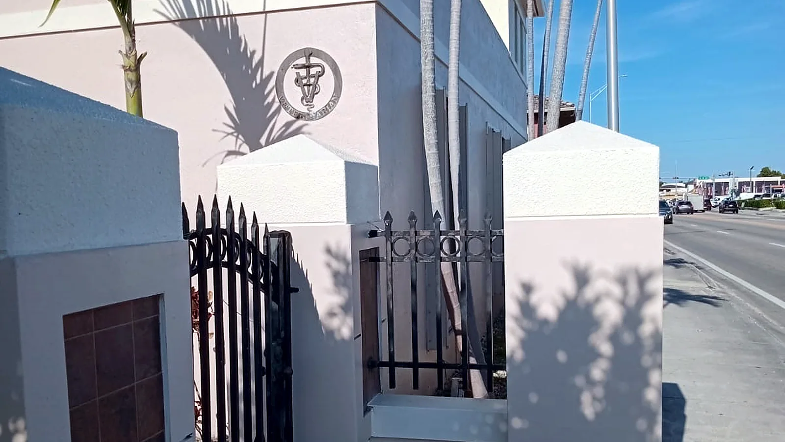 Repainted entrance columns and perimeter wall